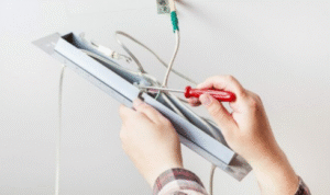Why is it wise to ask if existing wiring can handle new heavy appliances before renovating?