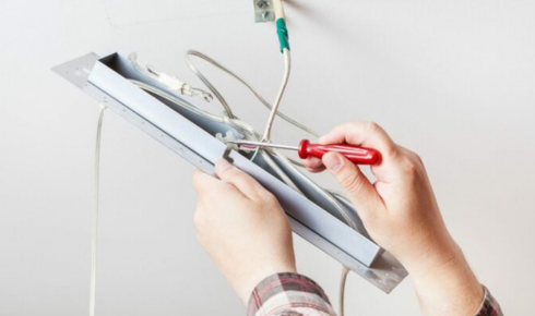 Why is it wise to ask if existing wiring can handle new heavy appliances before renovating?