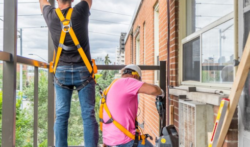 Why should you look for tiny rust spots on balcony railings as part of regular inspection?
