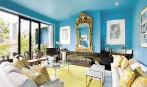 How can painting ceilings a very light shade instead of pure white soften harsh lighting?